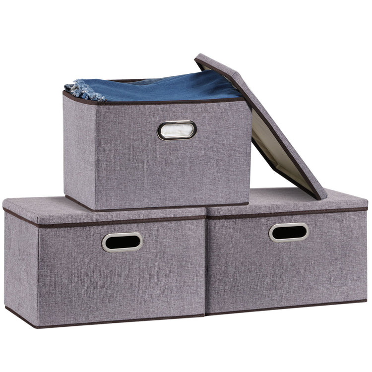 a stack of boxes with lid open