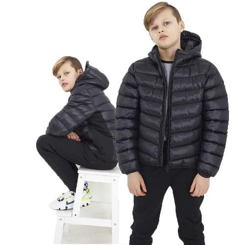 a boy in a black jacket
