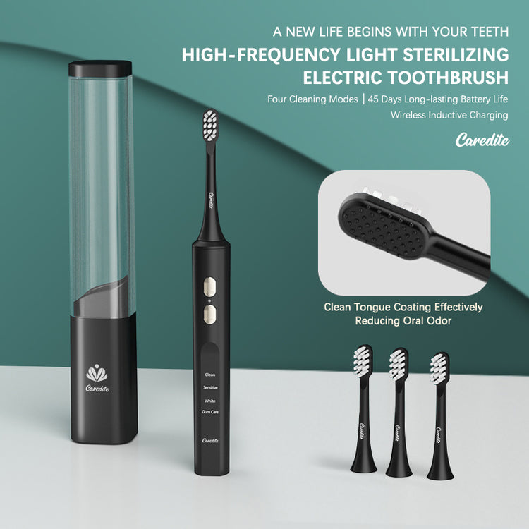 a black electric toothbrush and a tube