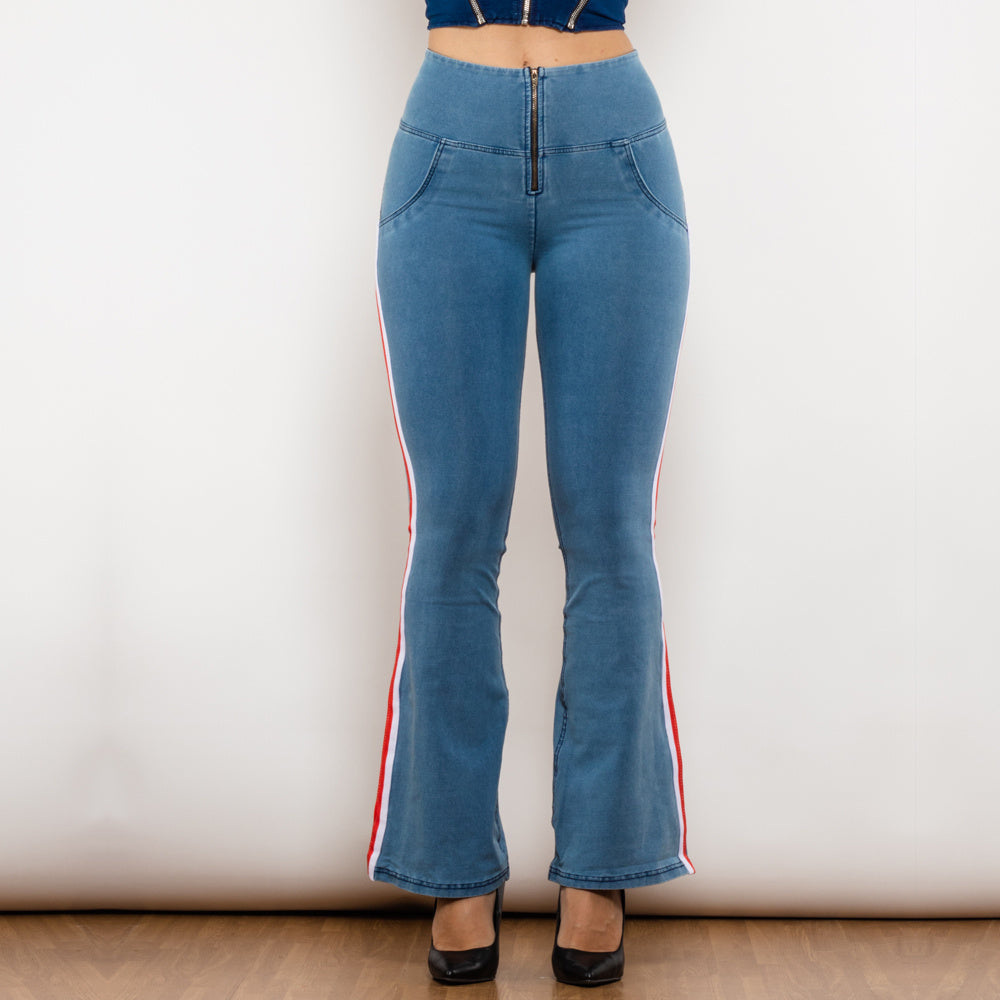 a woman wearing blue jeans