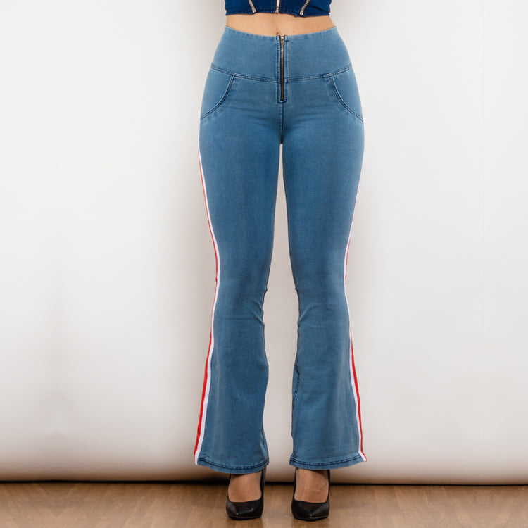 a woman wearing blue jeans