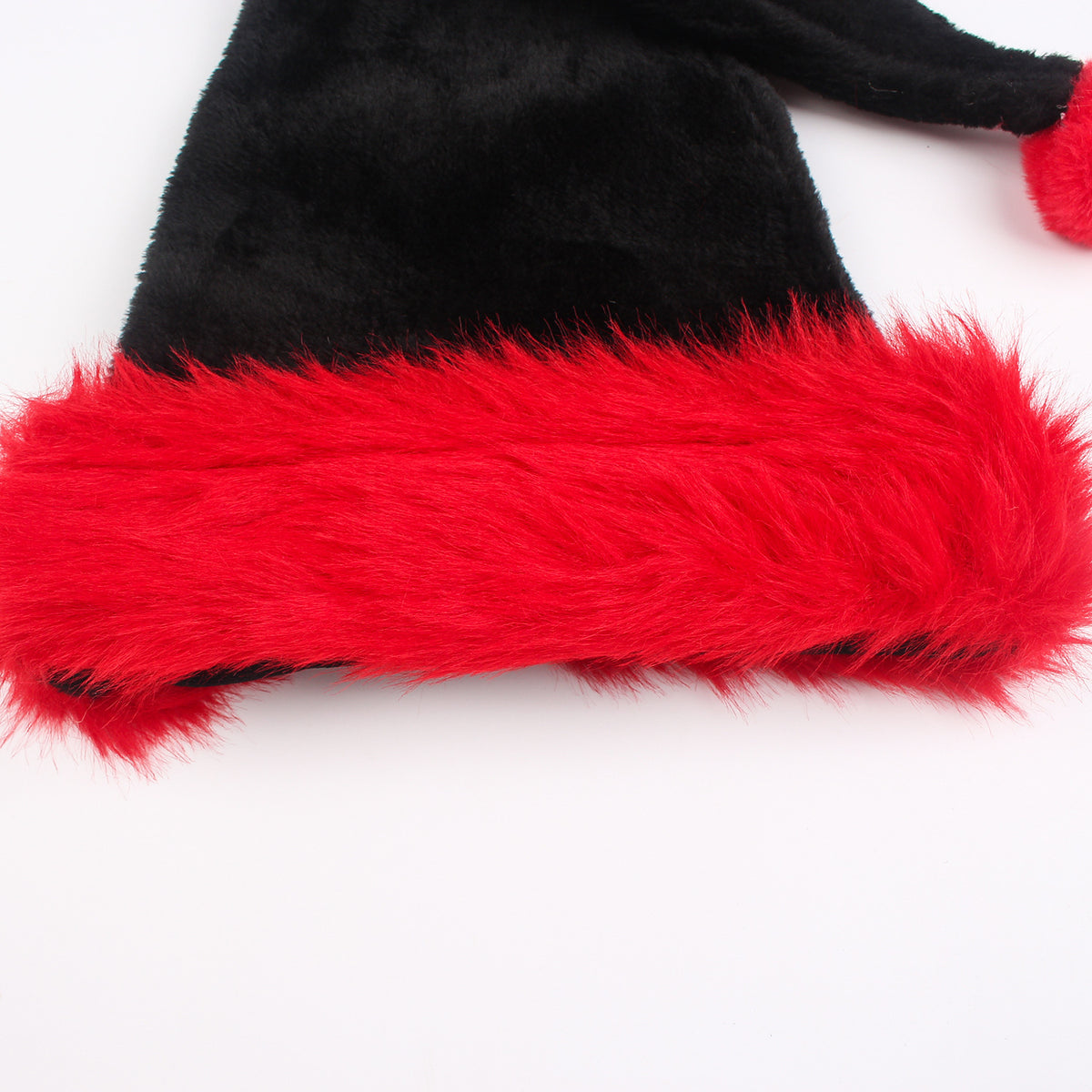 a black and red hat with a red furry trim