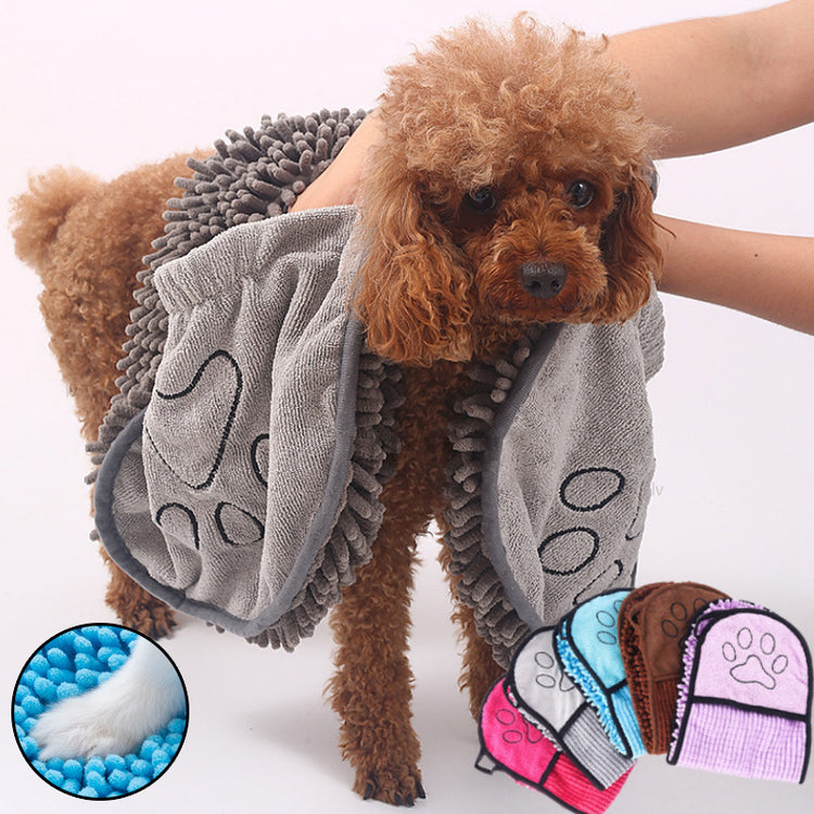 a dog with a towel on its head