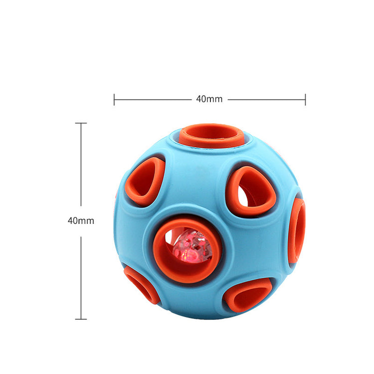 a blue and orange ball with a small light