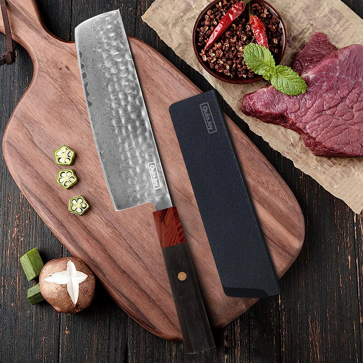 a knife and meat on a cutting board