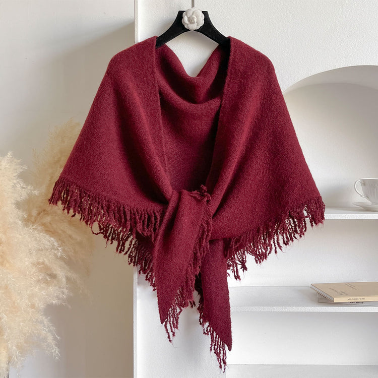 a red scarf on a swinger