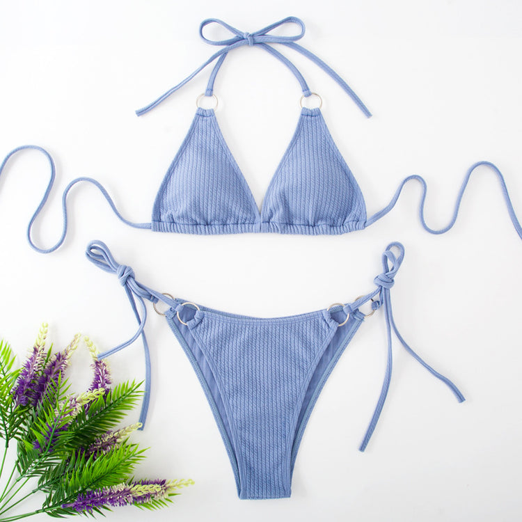 a blue garment with a bunch of flowers