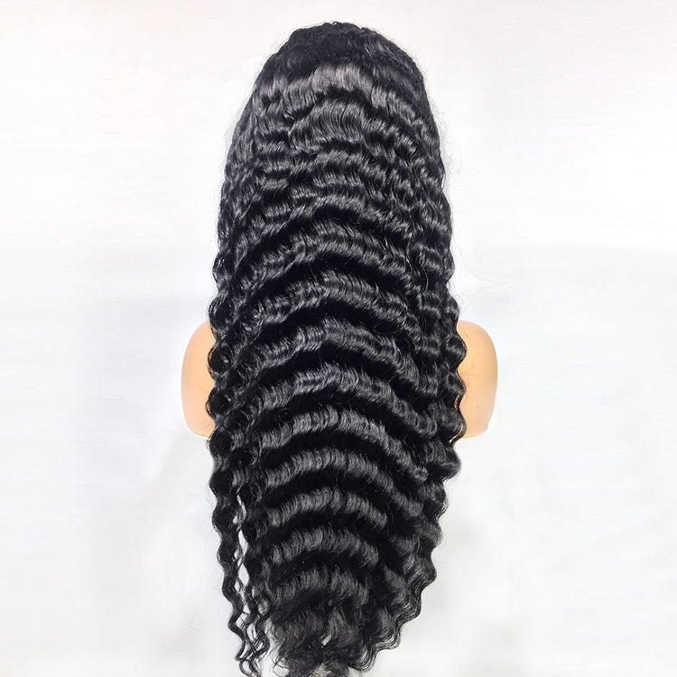 a black wig on a mannequin head