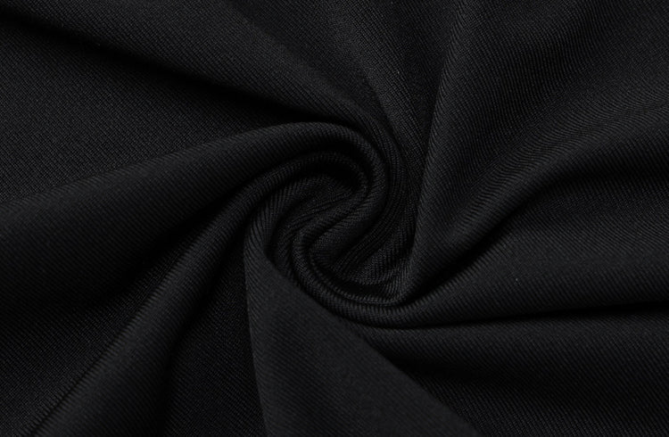 a black fabric with a spiral pattern