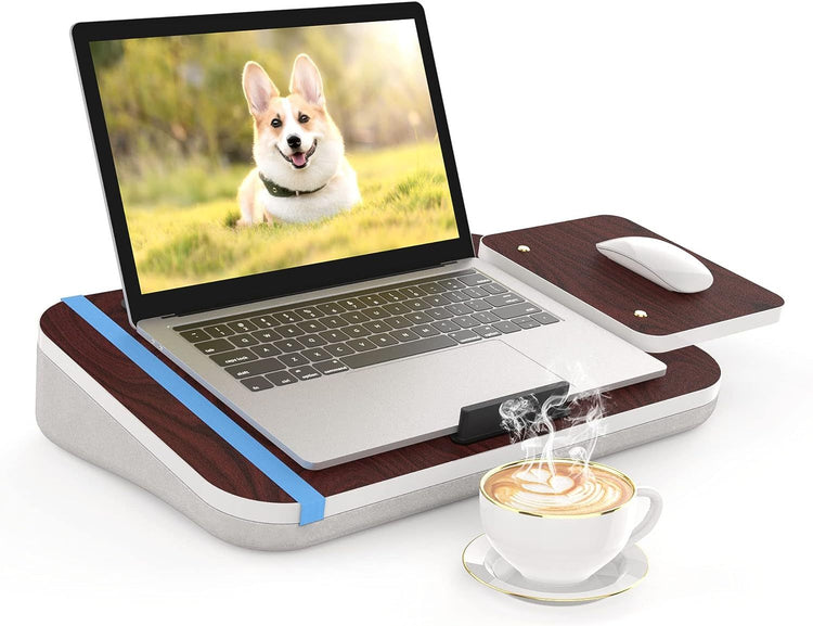 a laptop with a cup of coffee