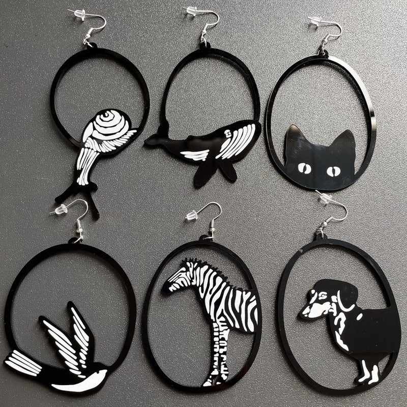 a group of earrings with different designs