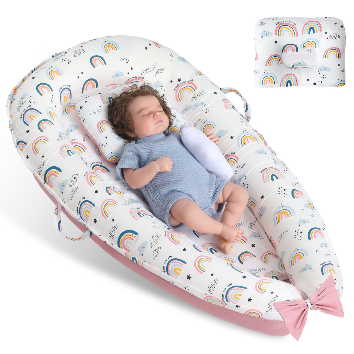 a baby doll sleeping in a baby bed