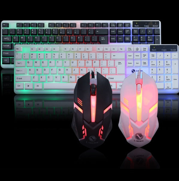 a keyboard and mouse on a black surface