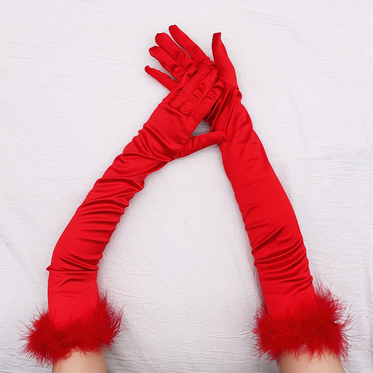 a pair of hands wearing red gloves