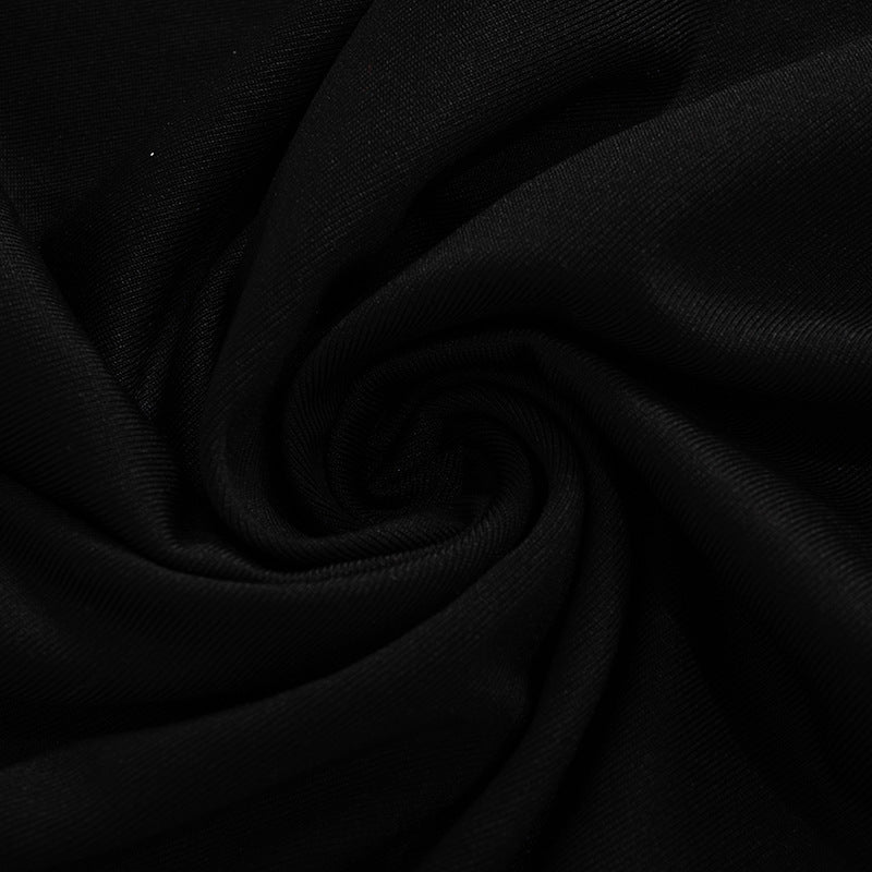 a black fabric with a spiral pattern