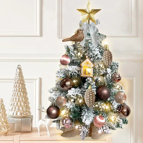 a small christmas tree with ornaments