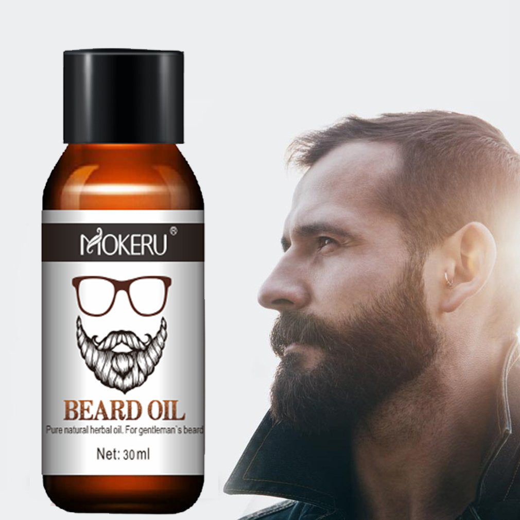 a man with a beard and a bottle of beard oil