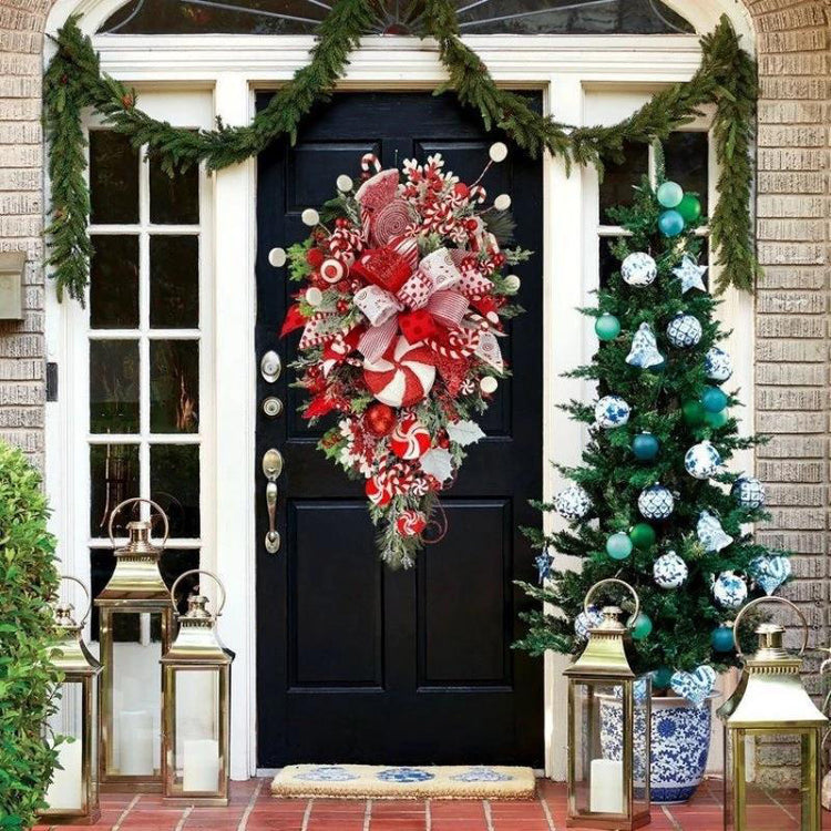 a door with a wreath and decorations