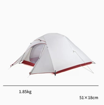a white tent with a red trim