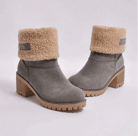 a pair of grey boots