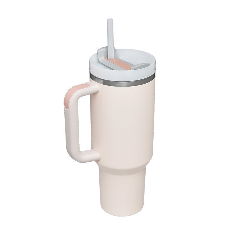 a white and pink coffee mug