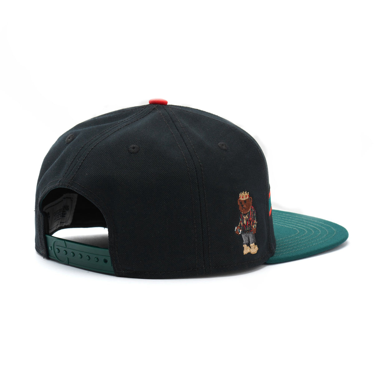 a black hat with a bear on it