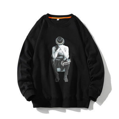 a black sweatshirt with a picture on it