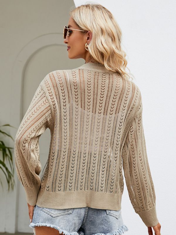 a woman wearing a sweater