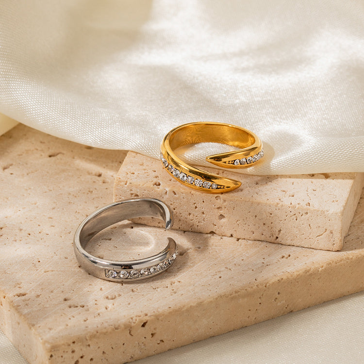 a pair of rings on a stone block