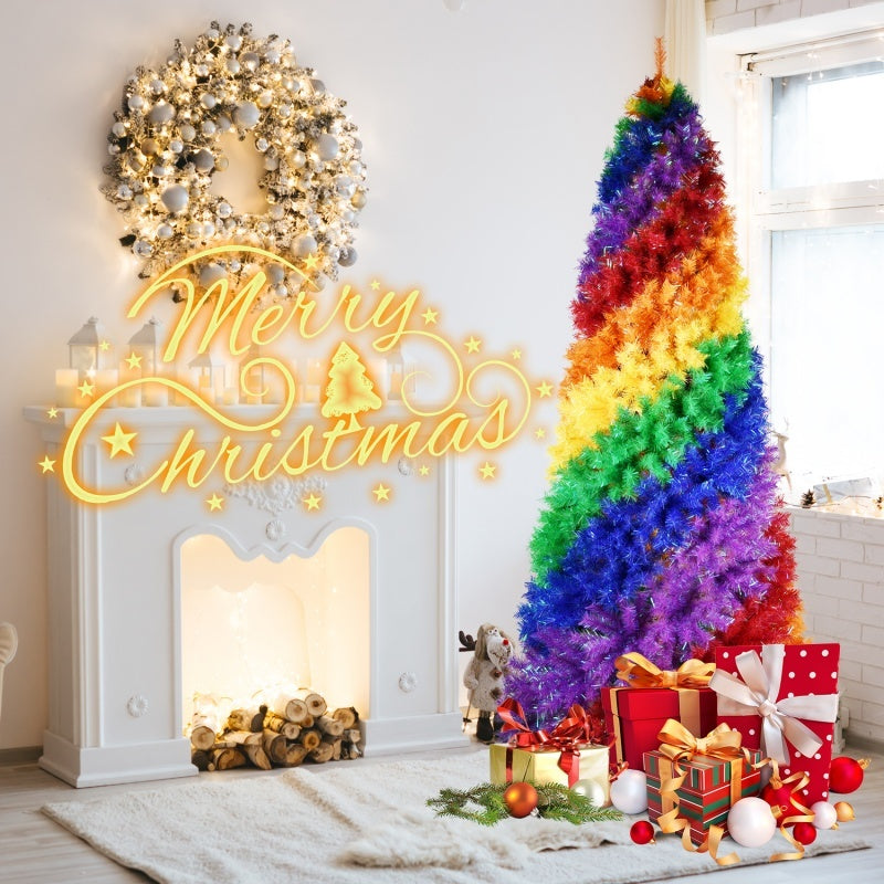 a rainbow colored christmas tree in a room with a fireplace