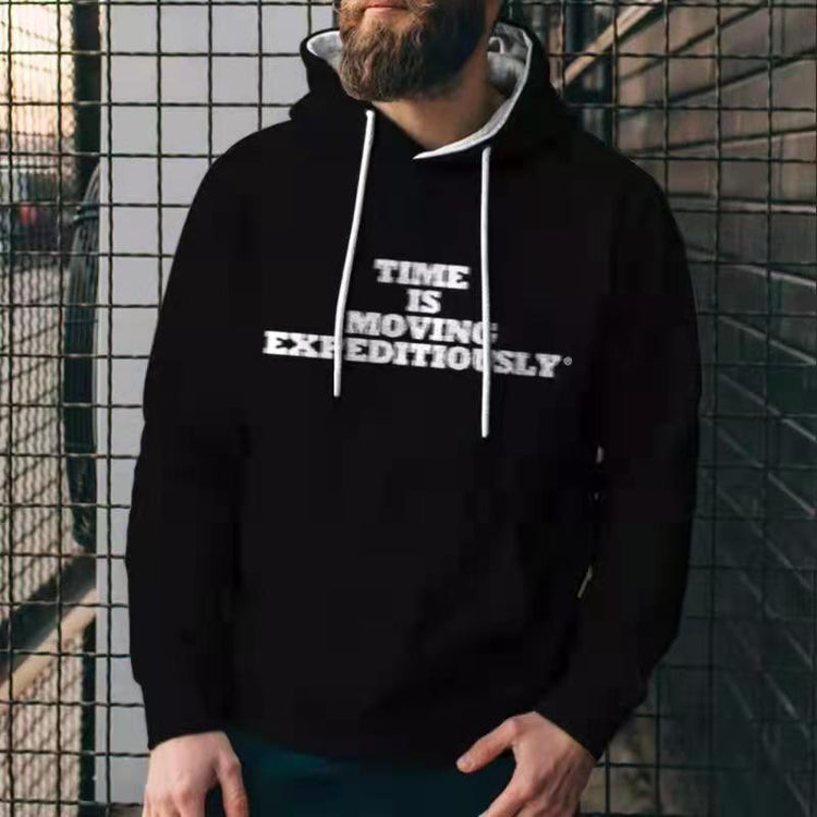 a man in a black hoodie