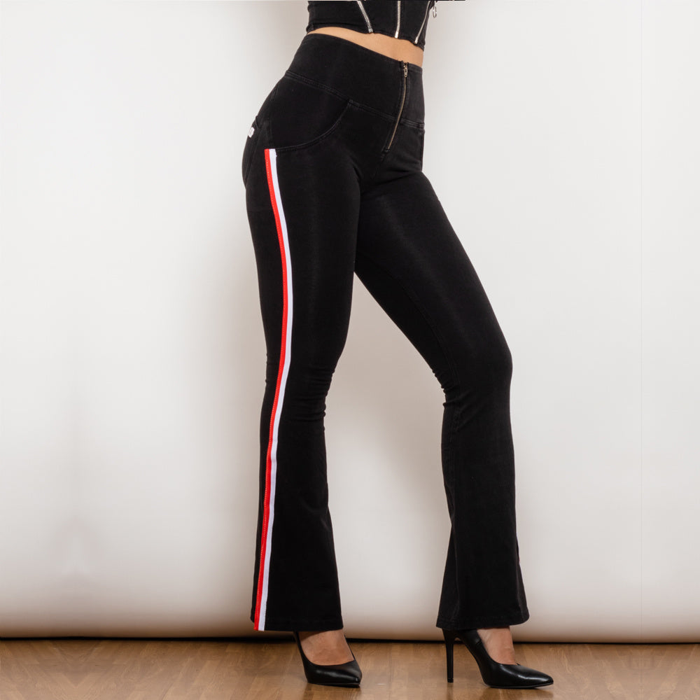 a woman wearing black pants