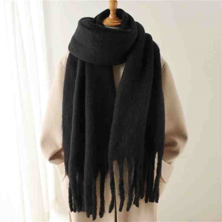 a black scarf on a mannequin
