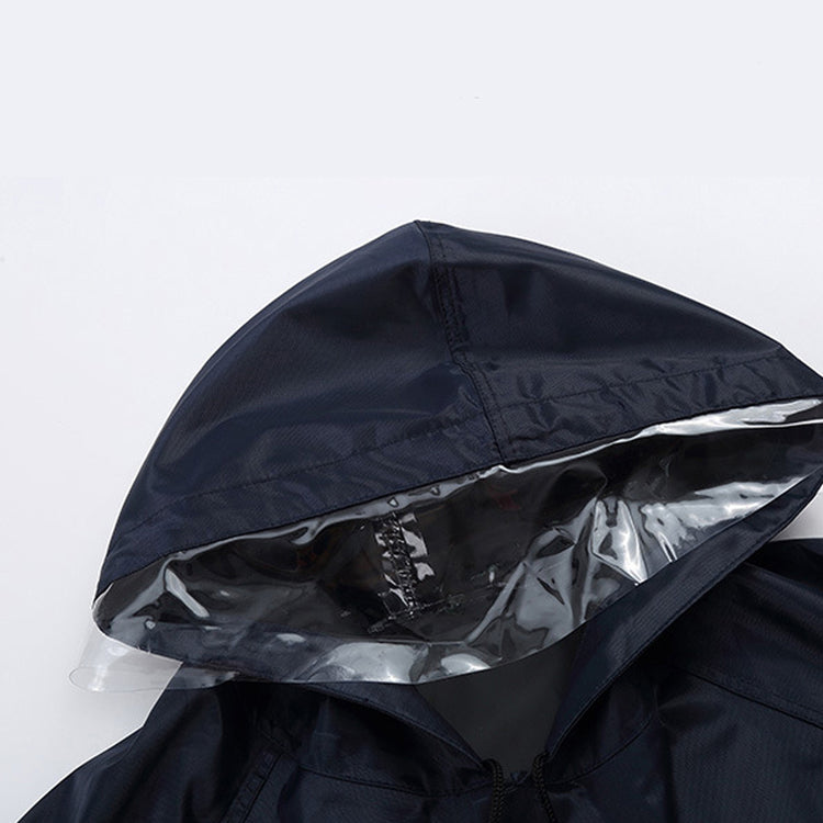 a black rain jacket with clear plastic