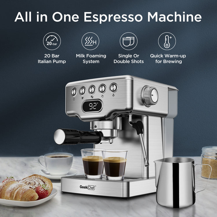 a silver espresso machine with cups of coffee and a plate of croissants