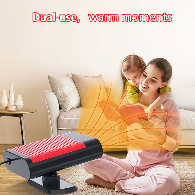 a woman and a child sitting on the floor with a heater