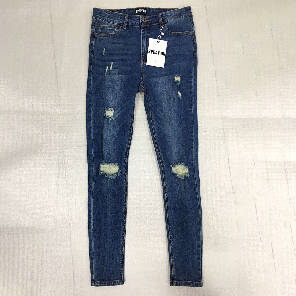 a pair of blue jeans with a tag