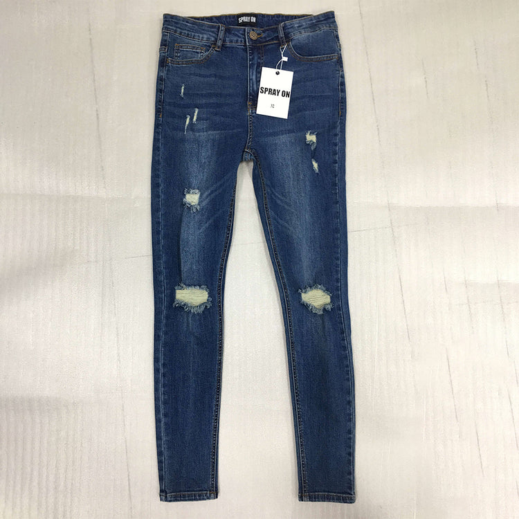 a pair of blue jeans with a tag