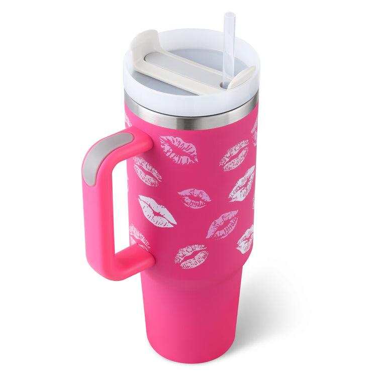 a pink and white travel mug