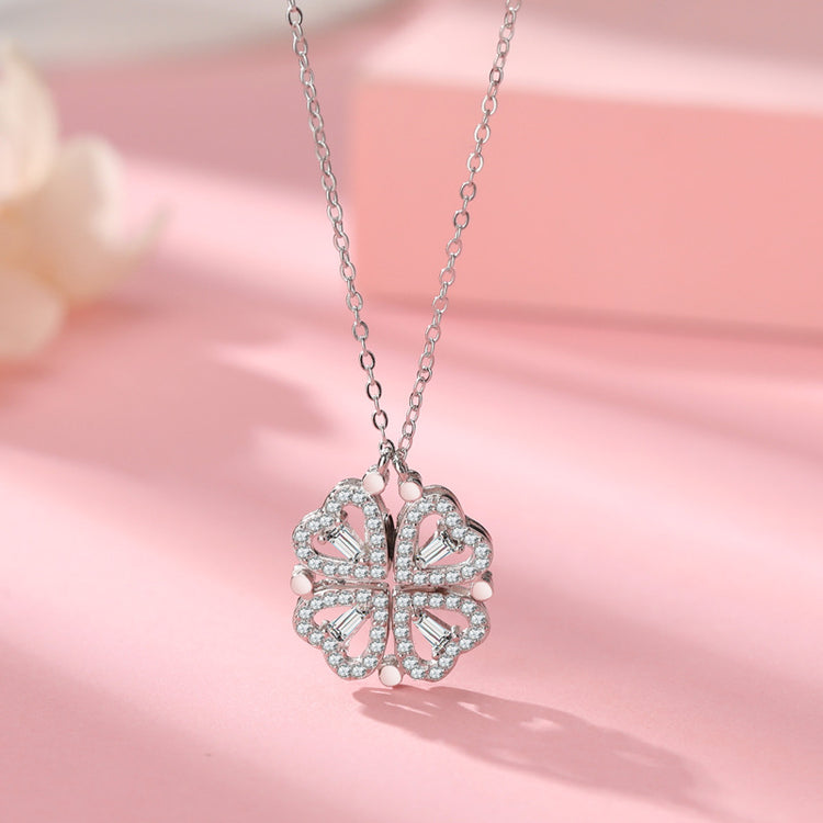 a necklace with a flower shaped pendant