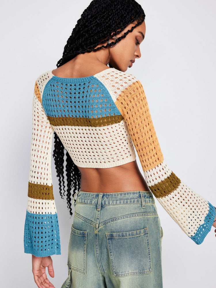 a woman in a knit sweater