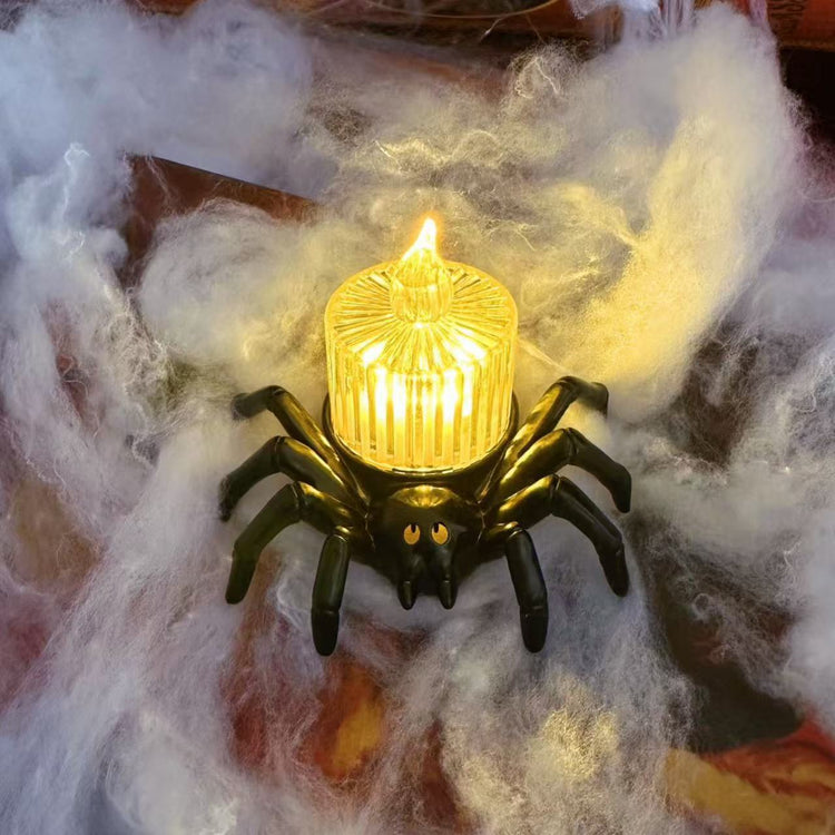a spider shaped light on a spider web