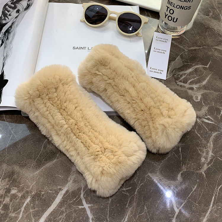 a pair of fur cases on a table