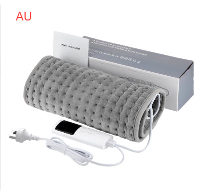 a grey blanket with a box and a cord