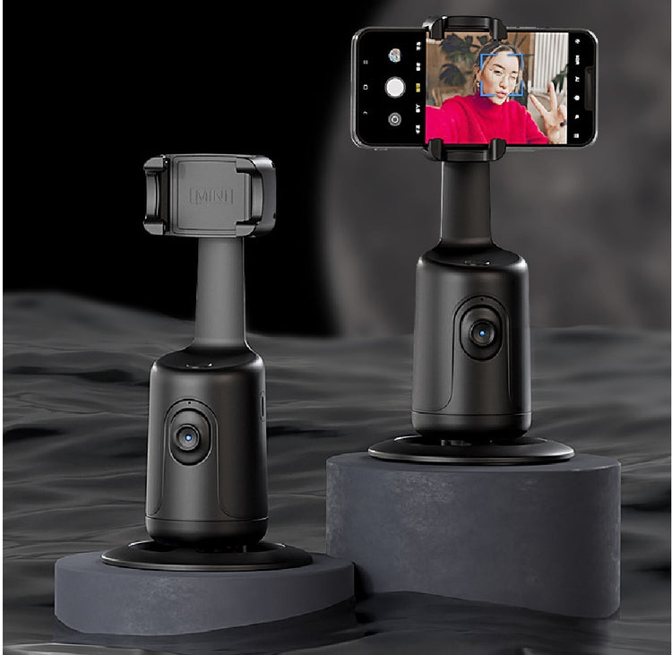 a couple of black objects with a cell phone on it
