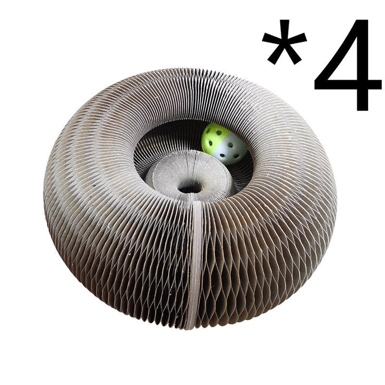 a paper spiral with a couple of green dice inside