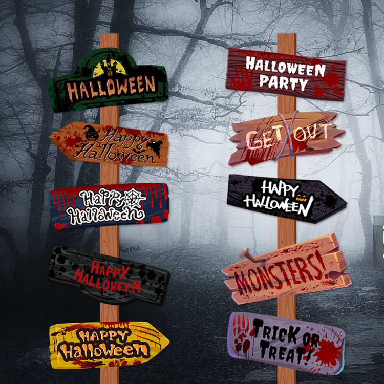 a group of signs in a forest