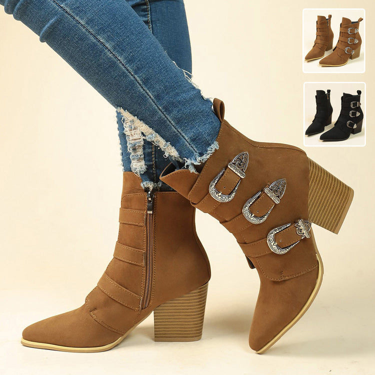 a person's legs with boots