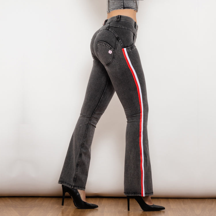 a woman in jeans and high heels