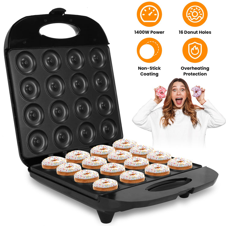 a woman holding donuts in a waffle maker